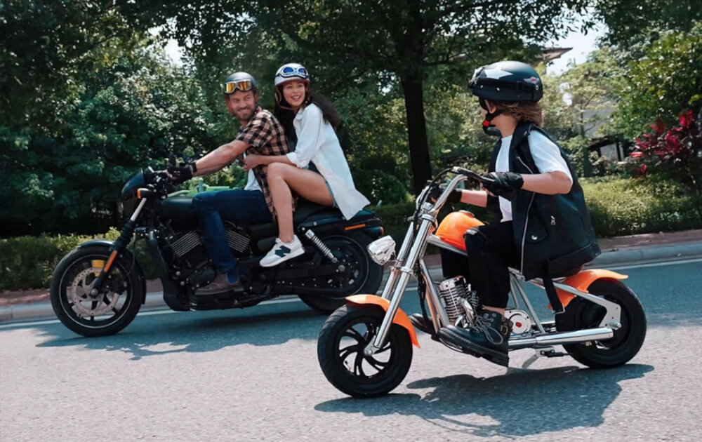 Motorek elektryczny XRIDER Cruiser 12 Plus aplikacja Pomarańczowo-czarny maksymalny kat nachylenia 12° maksymalna waga uzytkownika do 65 kg lekka konstrukcja 16 kg stylowy pomaranczowo-czarny design